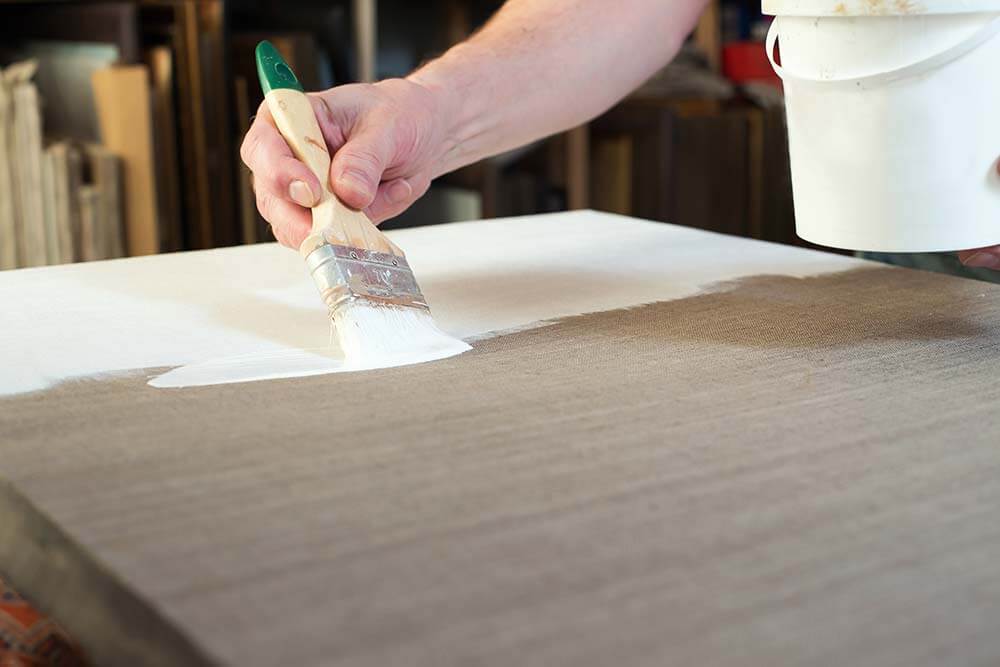 priming a canvas for watercolors